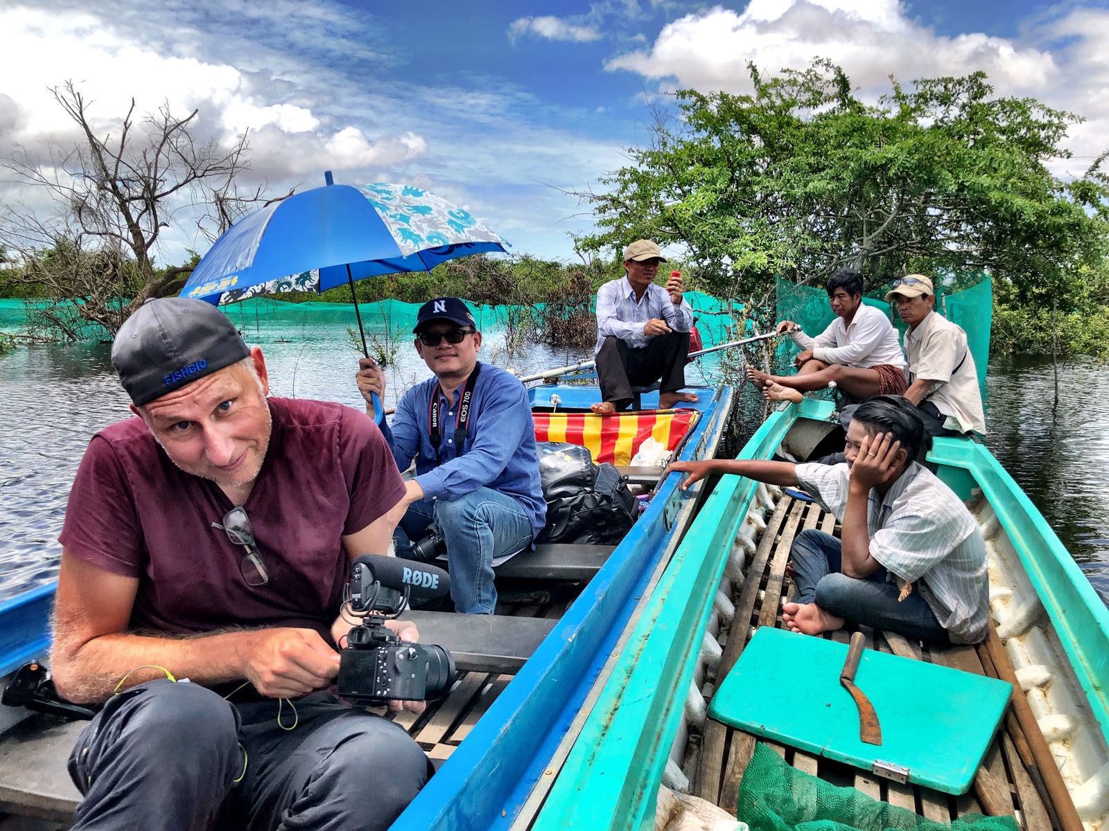 Stefan Lovgren filming on the Tonlé Sap lake, Cambodia